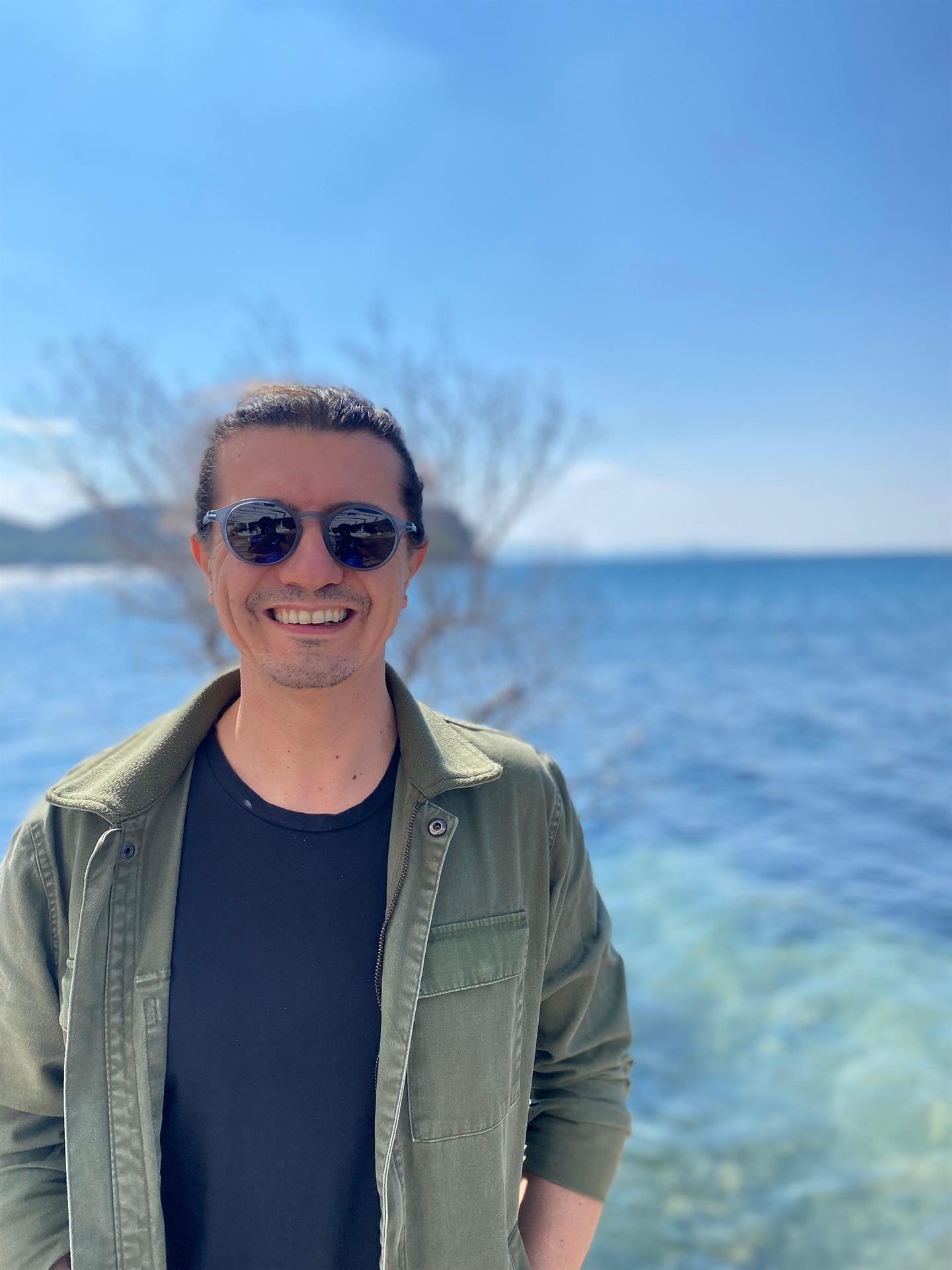 TOLGA TOPÇU